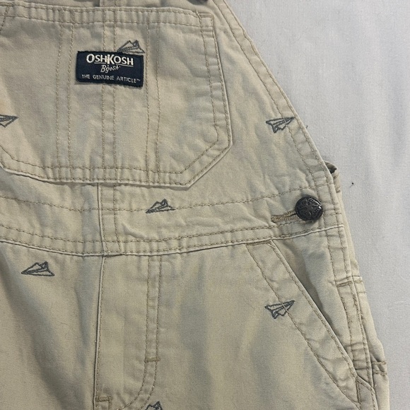 OshKosh B'gosh Kids Tan Overalls w/ embroidered paper airplane design - Picture 3 of 5